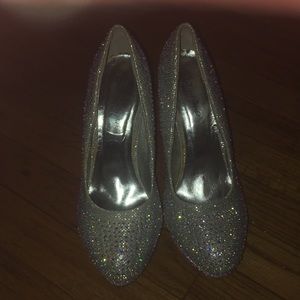 Lady's elegant heels sparkling in new condition